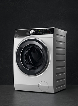 картинка Стиральная машина с сушкой Aeg LWR85165O 