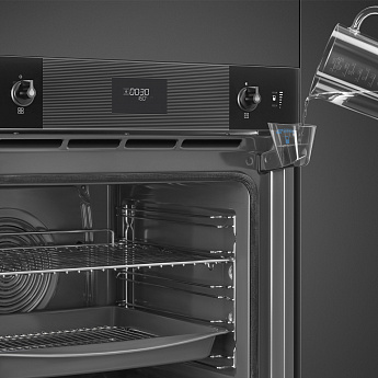 картинка Электрический духовой шкаф с функцией пара Smeg SOP6101S2B3 стекло Deep Black 
